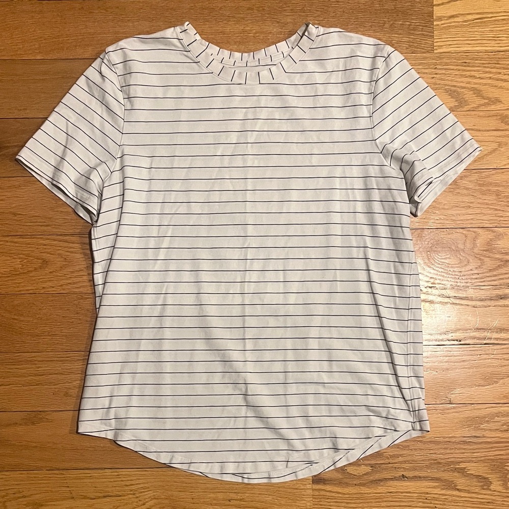 Lululemon Athletica White and Black Striped Tee with very small hole